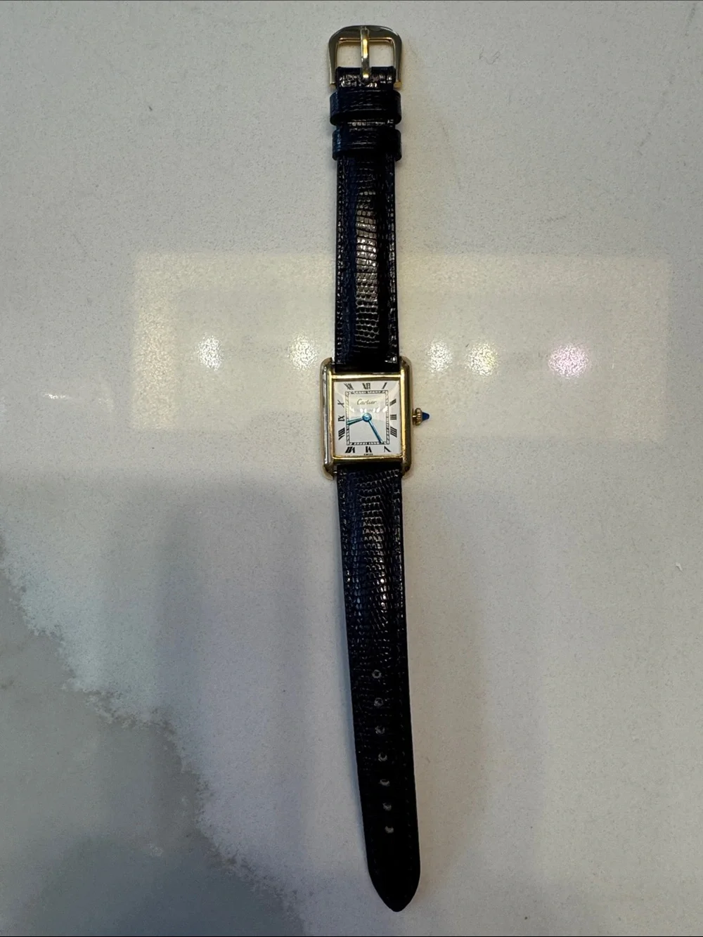 Cartier Gold Tone Rectangular Watch with dark brown Strap and sapphire Cabochon